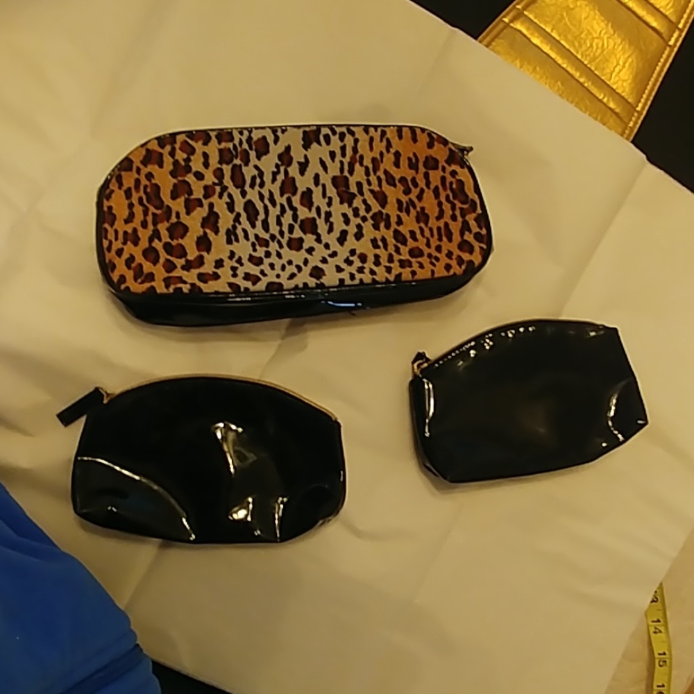A trio of makeup bags